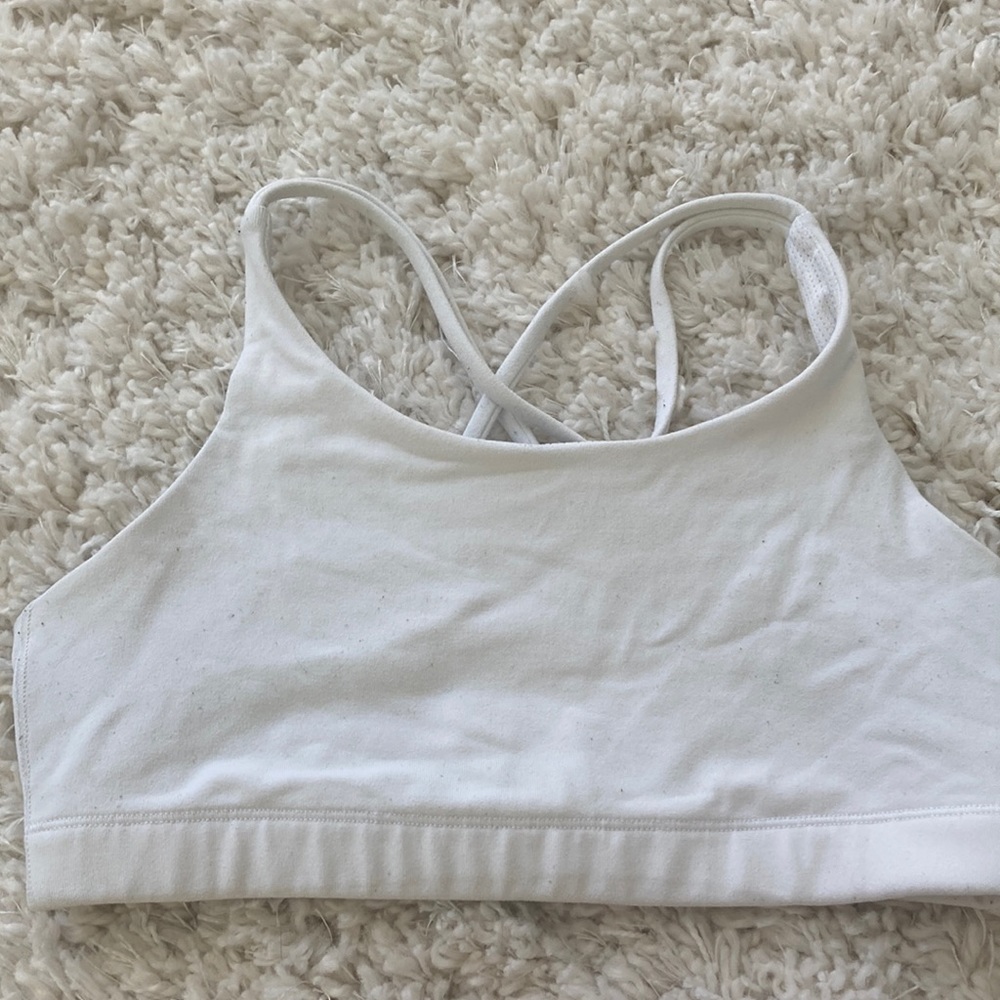 Athlete girl upbeat bra in white